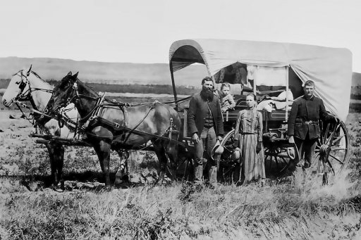 westward-family-in-covered-wagon-c-1886-daniel-hagerman.jpg