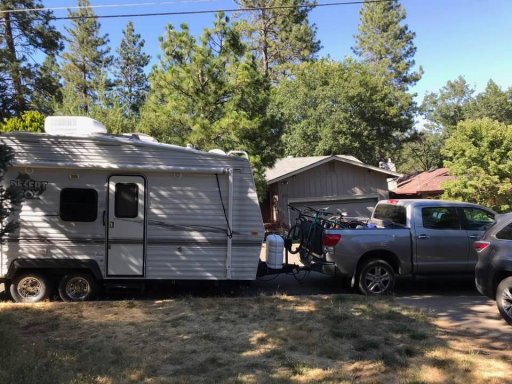 silver tundra and trailer.jpg