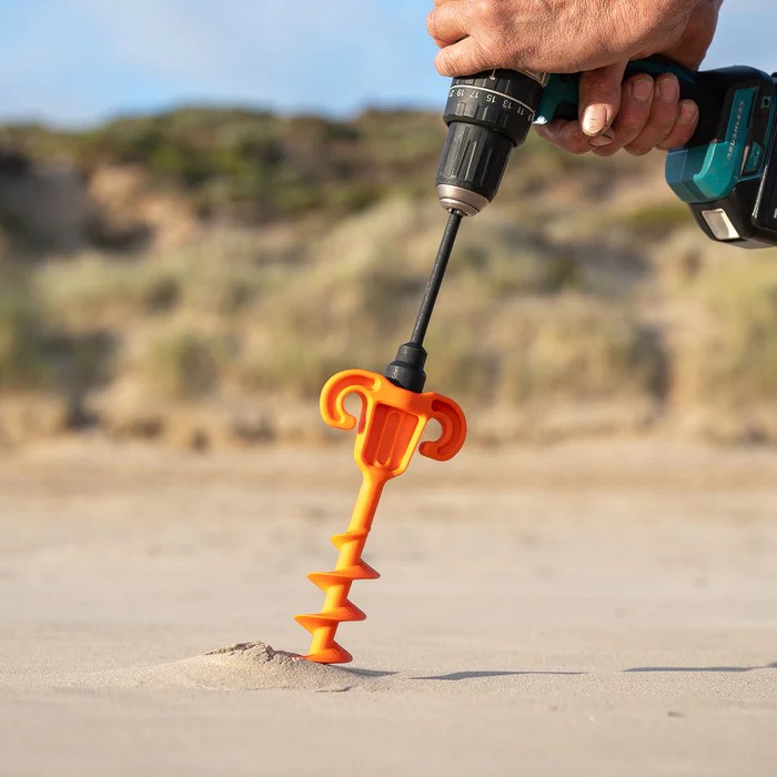 A Tiegear soft peg is drilled into sand. 