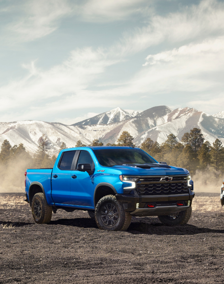 2025 Chevy Silverado in front of a mountain