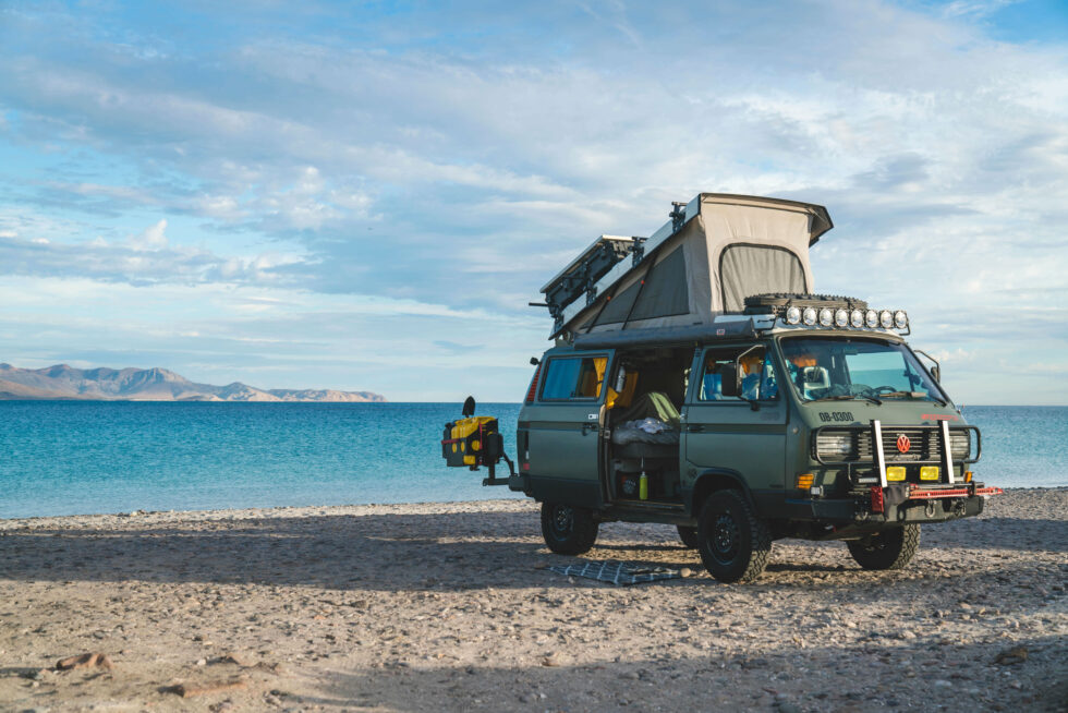 A Syncro van sitting by the ocean